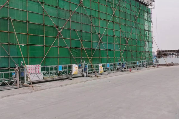 沈陽腳手架與電動吊籃的協(xié)同作戰(zhàn)：高效施工的黃金搭檔